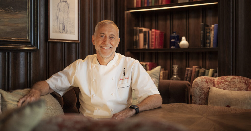 Chef Michel Roux sat on a sofa