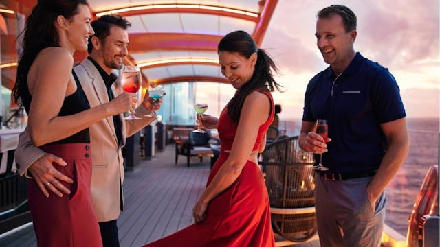 People enjoying drinks on the Magic Carpet